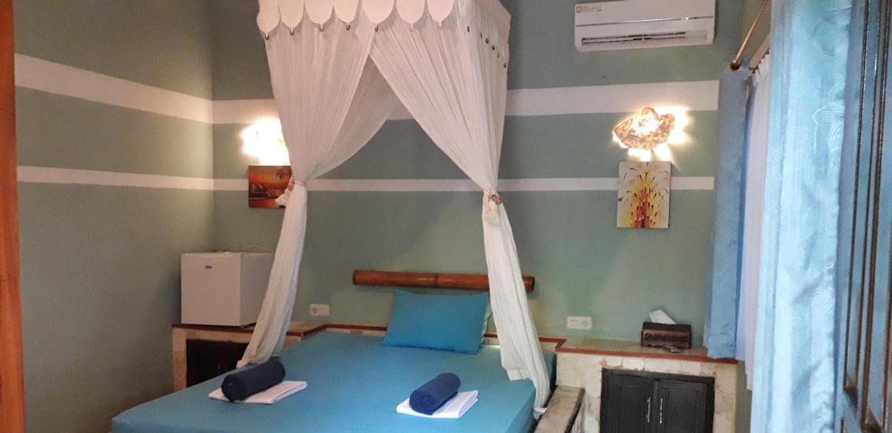 Mangga Lodge Bira Buitenkant foto